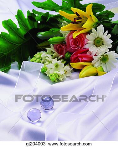 flower, bouquet, bead, cloths, cloth, fabric, ribbon View Large Photo Image Stock Image - flower, bouquet, bead, cloths, cloth, fabric, ribbon. Fotosearch
