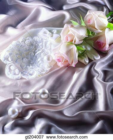 Stock Photo - flower, rose, bead, cloths, cloth, fabric, fancy goods. Fotosearch