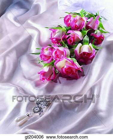 Stock Photograph - flower, rose, bouquet, earring, earrings, gem, jewel. Fotosearch