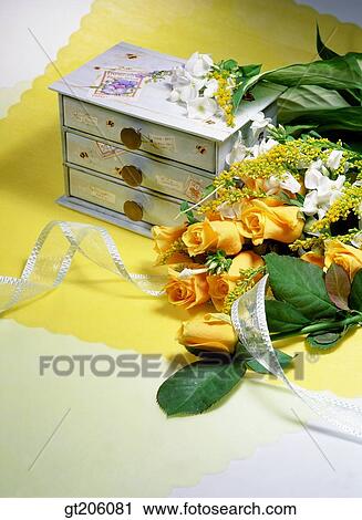 Stock Image - flower, bouquet, gem, jewel case, jewel box, ribbon, fancy goods. Fotosearch