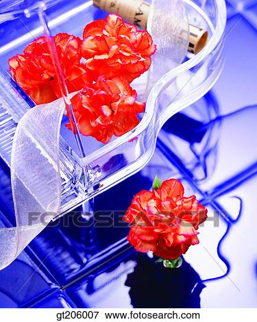 Stock Photo - flower, carnation, Carnation, ribbon, glassware, glass bottle, fancy goods. Fotosearch