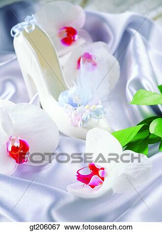 flower, glass shoes, Western orchid, cloths, cloth, fabric, fancy goods View Large Photo Image Stock Photo - flower, glass shoes, Western orchid, cloths, cloth, fabric, fancy goods. Fotosearch