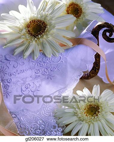 Stock Photo - flower, leaf, leaves, cloths, cloth, fabric, fancy goods. Fotosearch