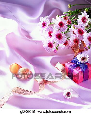 flower, present, container, bouquet, ribbon, cloths View Large Photo Image Stock Photography - flower, present, container, bouquet, ribbon, cloths. Fotosearch