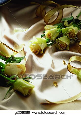 Stock Photo - flower, rose, bead, cloths, cloth, fabric, ribbon. Fotosearch