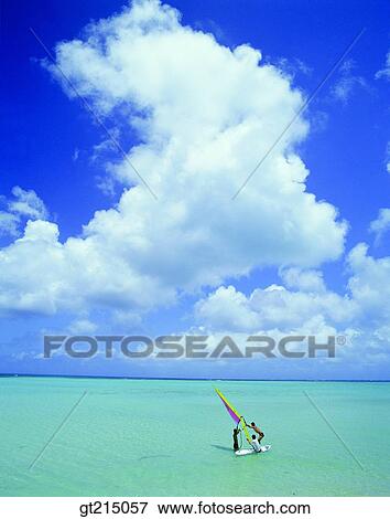 Stock Photo - sea, horizon, horizontal line, sky, cloud, windsurfing, leisure. Fotosearch