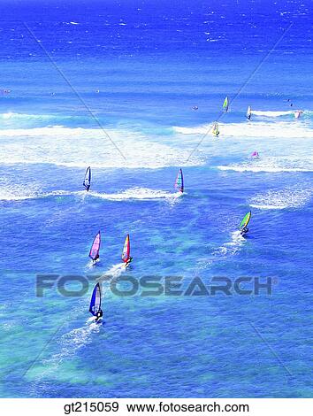 Stock Photo - sea, horizon, horizontal line, windsurfing, leisure, leports, leisure sports. Fotosearch