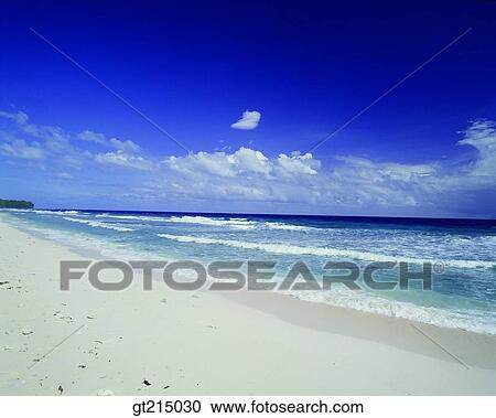 Stock Image - seashore, coast, sandy beach, beach, sky, cloudsea, outdoor. Fotosearch