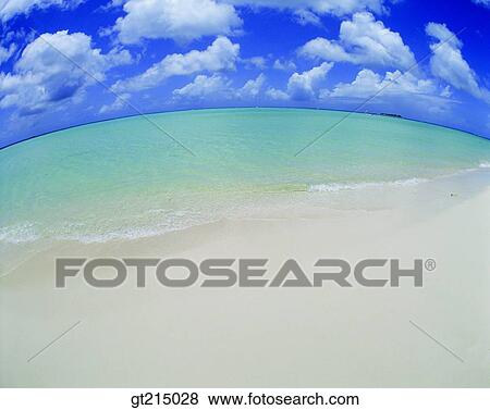 Stock Photo - seashore, coast, sandy beach, beach, sky, cloudsea, outdoor. Fotosearch