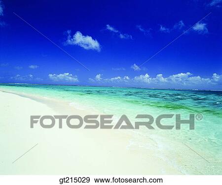 Stock Photo - seashore, coast, sandy beach, beach, sky, cloudsea, outdoor. Fotosearch
