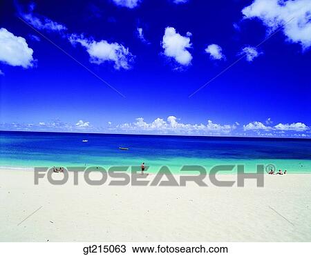Stock Image - seashore, sandy beach, beach, sandy beach, person, outdoor, exterior. Fotosearch
