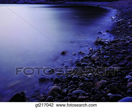 Stock Image - nature, landscape, scenery, scene, lake, gravel, pebbles. Fotosearch