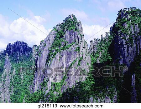 cliff, mountain, rock mountain, tree, green, cky, cloud View Large Photo Image Stock Photo - cliff, mountain, rock mountain, tree, green, cky, cloud. Fotosearch