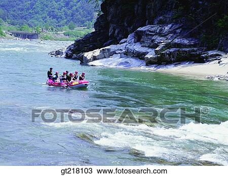 Stock Image - person, exterior, day, daytime, daylight, rafting, river. Fotosearch