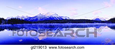 lake, mountain, winter, remaining snow, reflection, reflect, forest View Large Photo Image Stock Image - lake, mountain, winter, remaining snow, reflection, reflect, forest. Fotosearch