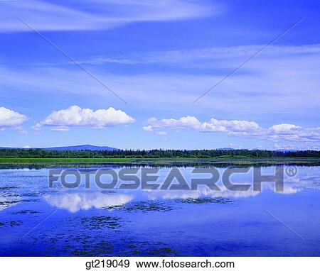 Stock Photo - lake, reflection, reflect, sky, cloud, clouds, outdoor. Fotosearch