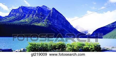 Stock Photo - mountain, lake, mountaintop, peak, sky, cloud, clouds. Fotosearch