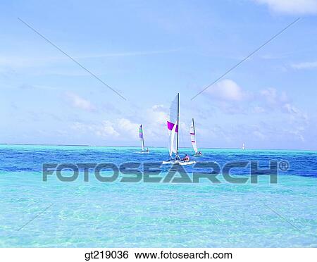 Stock Photograph - wind surfing, surfing, sea, sky, cloud, clouds, people. Fotosearch
