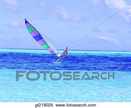 Stock Photography - wind surfing, surfing, sea, sky, cloud, clouds, people. Fotosearch