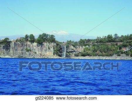 Stock Photography - Korea, Cheju Island, Cheju, Jungbang waterfall, waterfall. Fotosearch