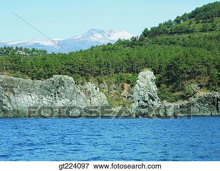 Korea, Cheju Island, Cheju, Songsanilchulbong View Large Photo Image Stock Photo - Korea, Cheju Island, Cheju, Songsanilchulbong. Fotosearch