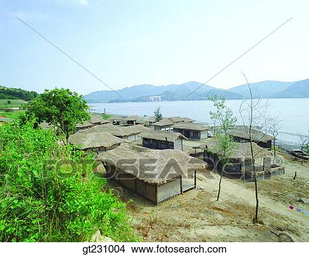 cottage, farm village, farming village, village, province, country, town View Large Photo Image Picture - cottage, farm village, farming village, village, province, country, town. Fotosearch