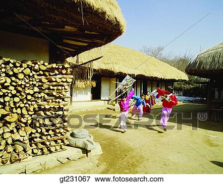 Stock Photo - flying a kite, kite, child, children, kid, Korean clothes, Korean dress. Fotosearch