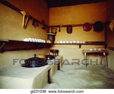 Stock Photograph - kitchen, folk town, kitchen range, fireplace, shel, rack, kettle. Fotosearch