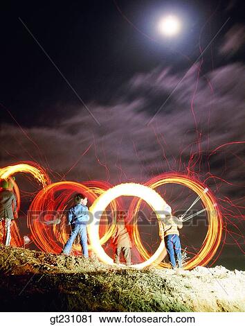 Stock Image - play, game, province, country, full moon, fire, child. Fotosearch
