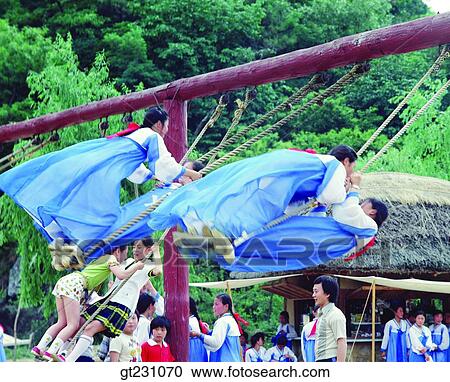 Stock Image - swing, woman, women, female, Korean clothes, Korean dress, province. Fotosearch