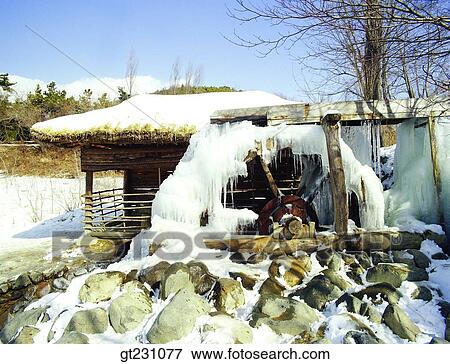 Stock Photo - water mill, mortar, winter, cottage, ice, icicle, outdoor. Fotosearch