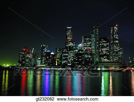 Stock Image - outdoor, exterior, night, night view, city, town scene, scene. Fotosearch