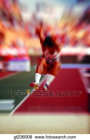 Stock Photo - broad jump, long jump, people, person, game, match, contest. Fotosearch
