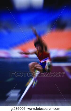Stock Photograph - broad jump, long jump, people, person, game, match, contest. Fotosearch