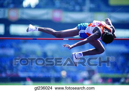 Picture - high jump, high leap, people, person, national athlete, Olympic, Olympics. Fotosearch