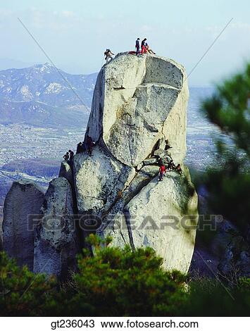 Stock Image - rock climbing, climbing, climb, people, person, leisure, hobby. Fotosearch