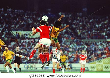 Stock Photo - soccer, football, people, person, heading, soccer game, football game. Fotosearch