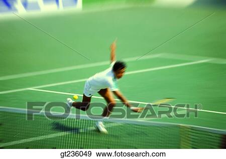 Stock Photo - tennis, people, person, tennis court, tennis game, match, contest. Fotosearch