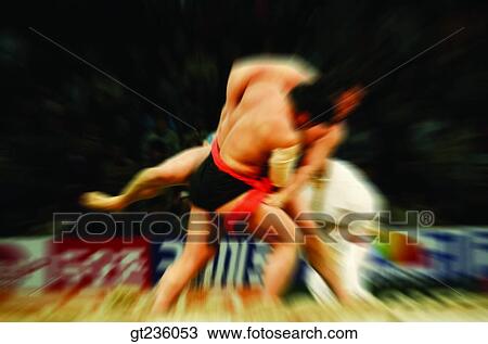 Stock Image - wrestling, people, person, folk, tradition, wrestling court, wrestling player. Fotosearch