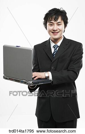 person, oriental, Korean, Asian, business, businessman View Large Photo Image Stock Photography - person, oriental, Korean, Asian, business, businessman. Fotosearch