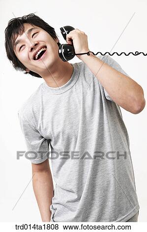 person, oriental, Korean, Asian, young man, phone View Large Photo Image Stock Photo - person, oriental, Korean, Asian, young man, phone. Fotosearch