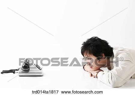 Stock Photo - person, oriental, Korean, Asian, young man, phone. Fotosearch