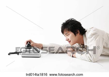 person, oriental, Korean, Asian, young man, phone View Large Photo Image Stock Photograph - person, oriental, Korean, Asian, young man, phone. Fotosearch