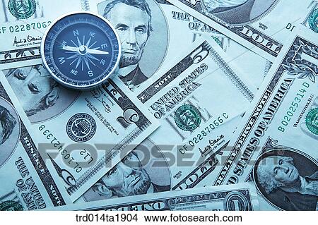 business, money, paper money, foreign currency, dollar, compass, economy View Large Photo Image Picture - business, money, paper money, foreign currency, dollar, compass, economy. Fotosearch