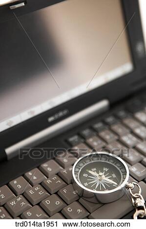 Stock Image - business, notebook, compass, close up. Fotosearch