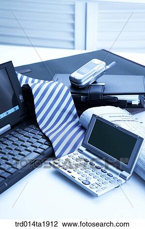 Stock Image - business, notebook, PDA, necktie. Fotosearch