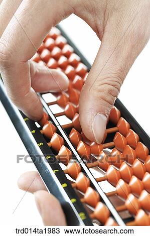 Stock Image - person, business, businessman, body, hand, abacus, close up. Fotosearch