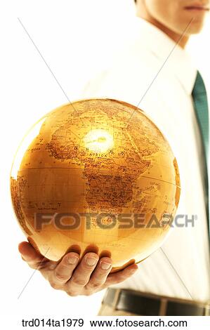 Stock Photo - person, business, businessman, body, hand, close up, earth. Fotosearch