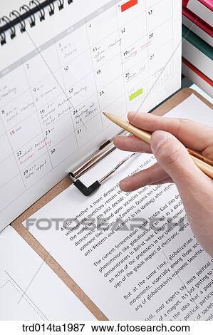Stock Photo - person, business, businessman, body, hand, close up, calendar. Fotosearch