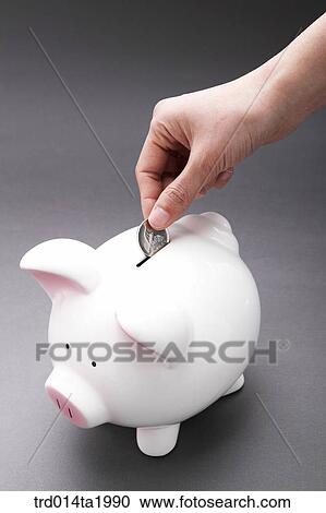 Stock Image - person, business, businessman, savings box, pigsavings box, saving, coin. Fotosearch